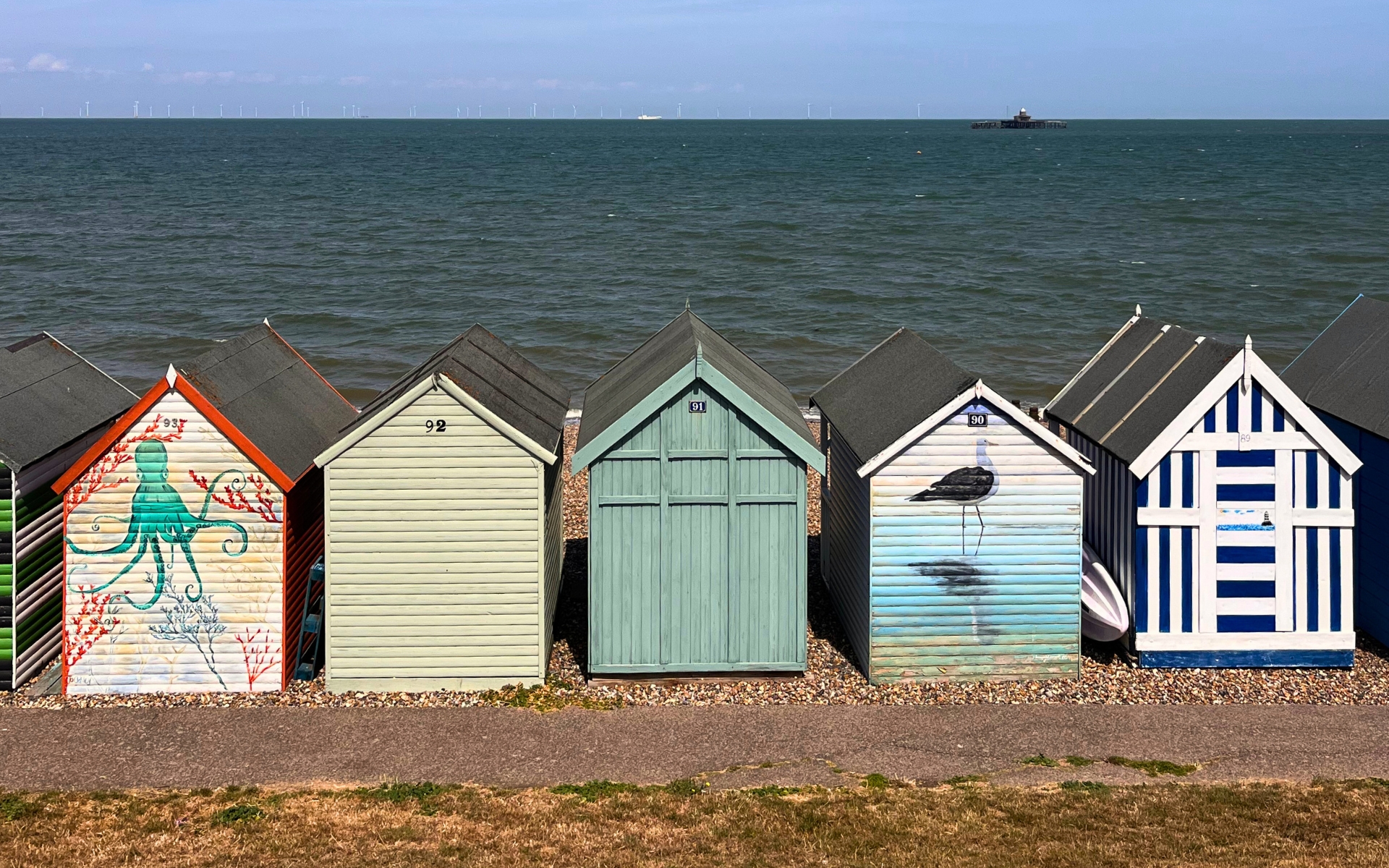 Painted beach huts on the Whitstable seafront
